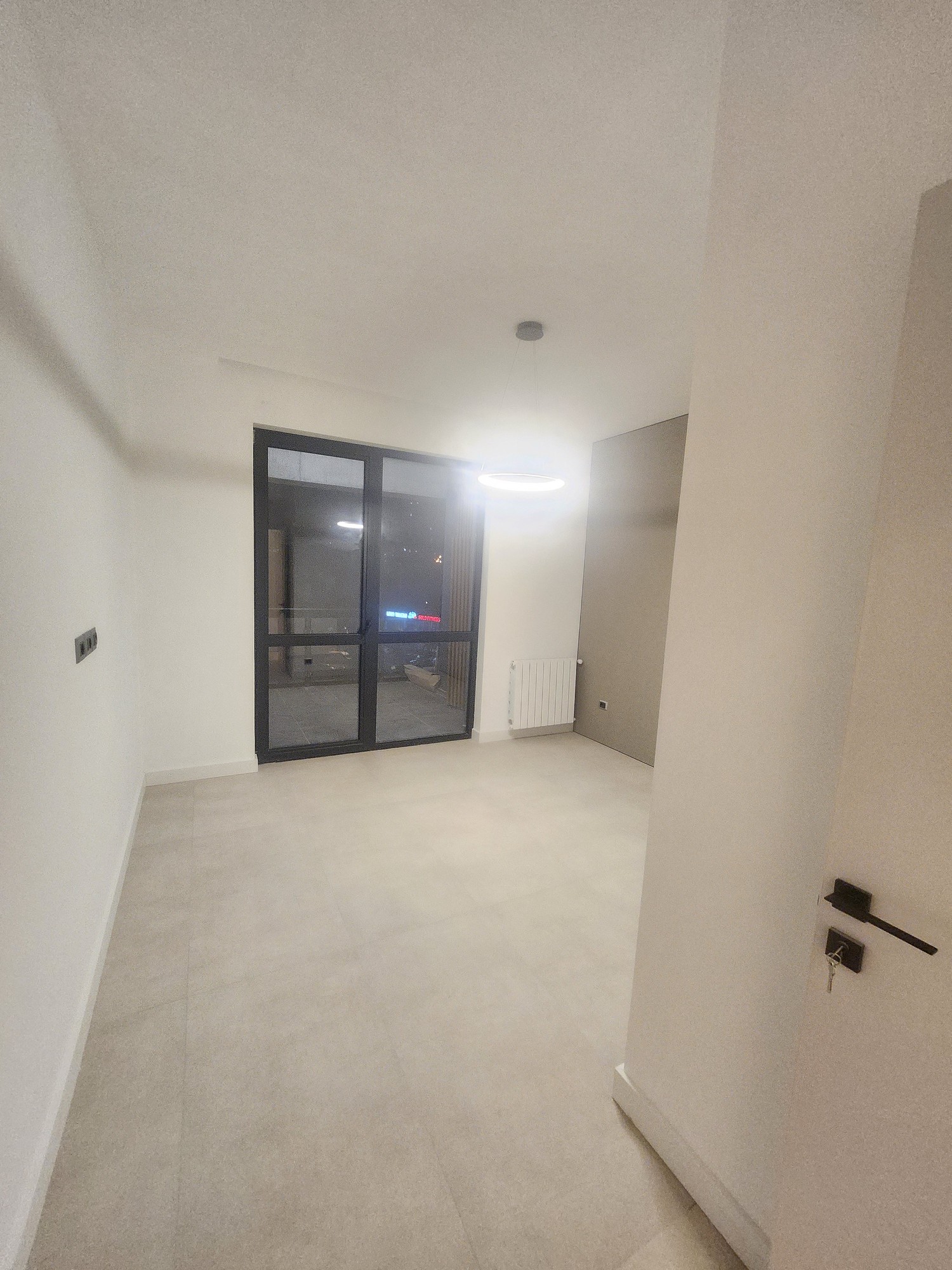 Living room entertainment center with large TV