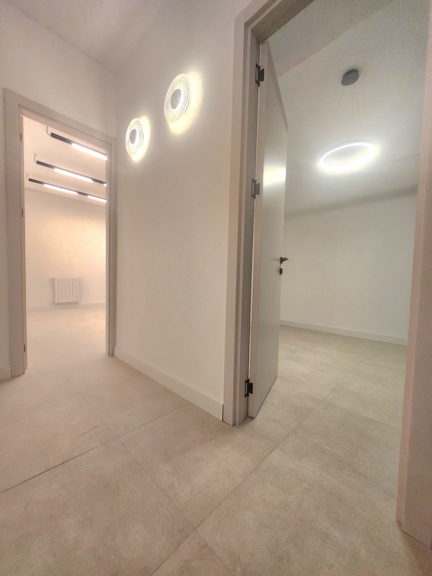 Master bedroom with king bed and elegant linens