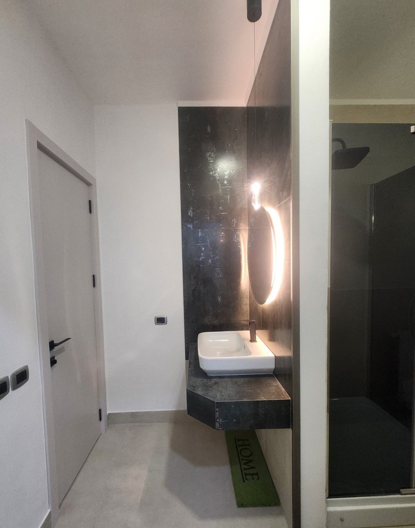 Master bathroom shower with glass enclosure