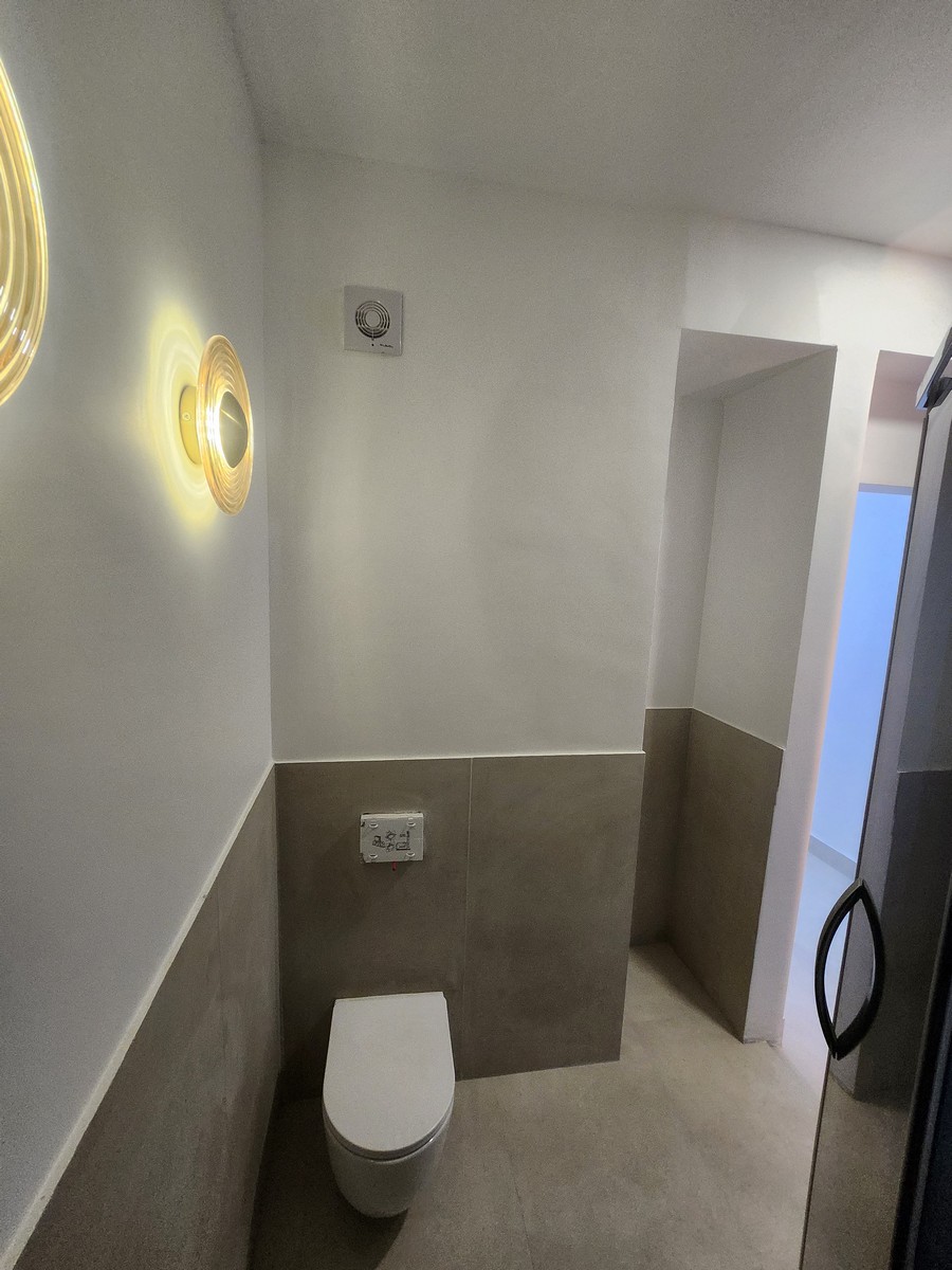 Master bathroom storage and cabinetry