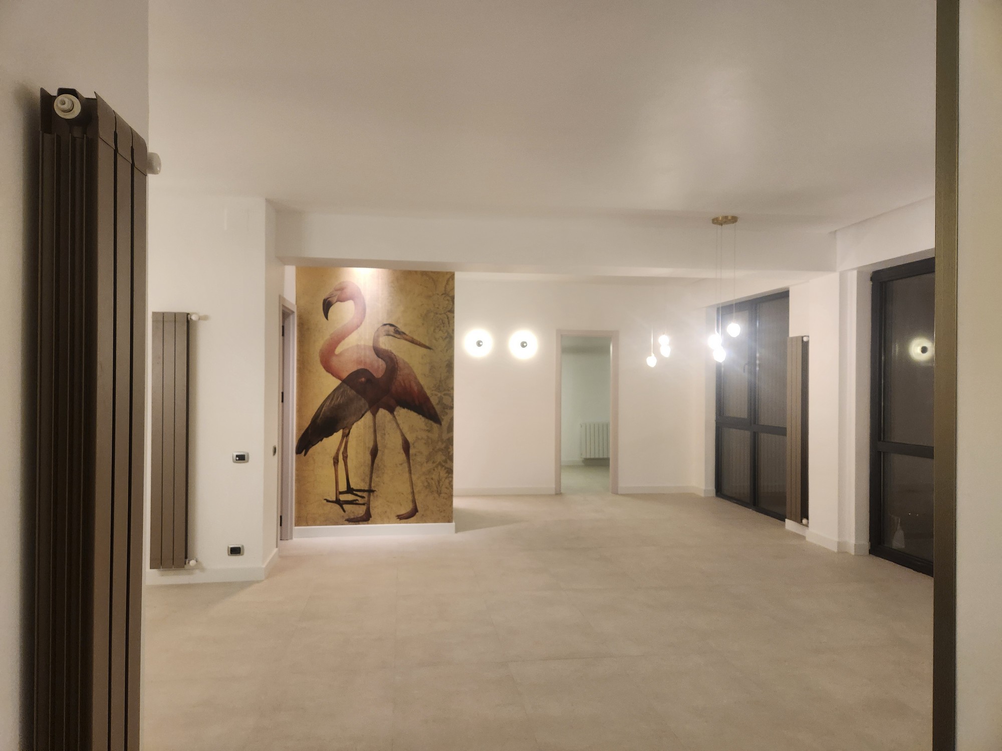 Guest bathroom with modern fixtures and glass shower