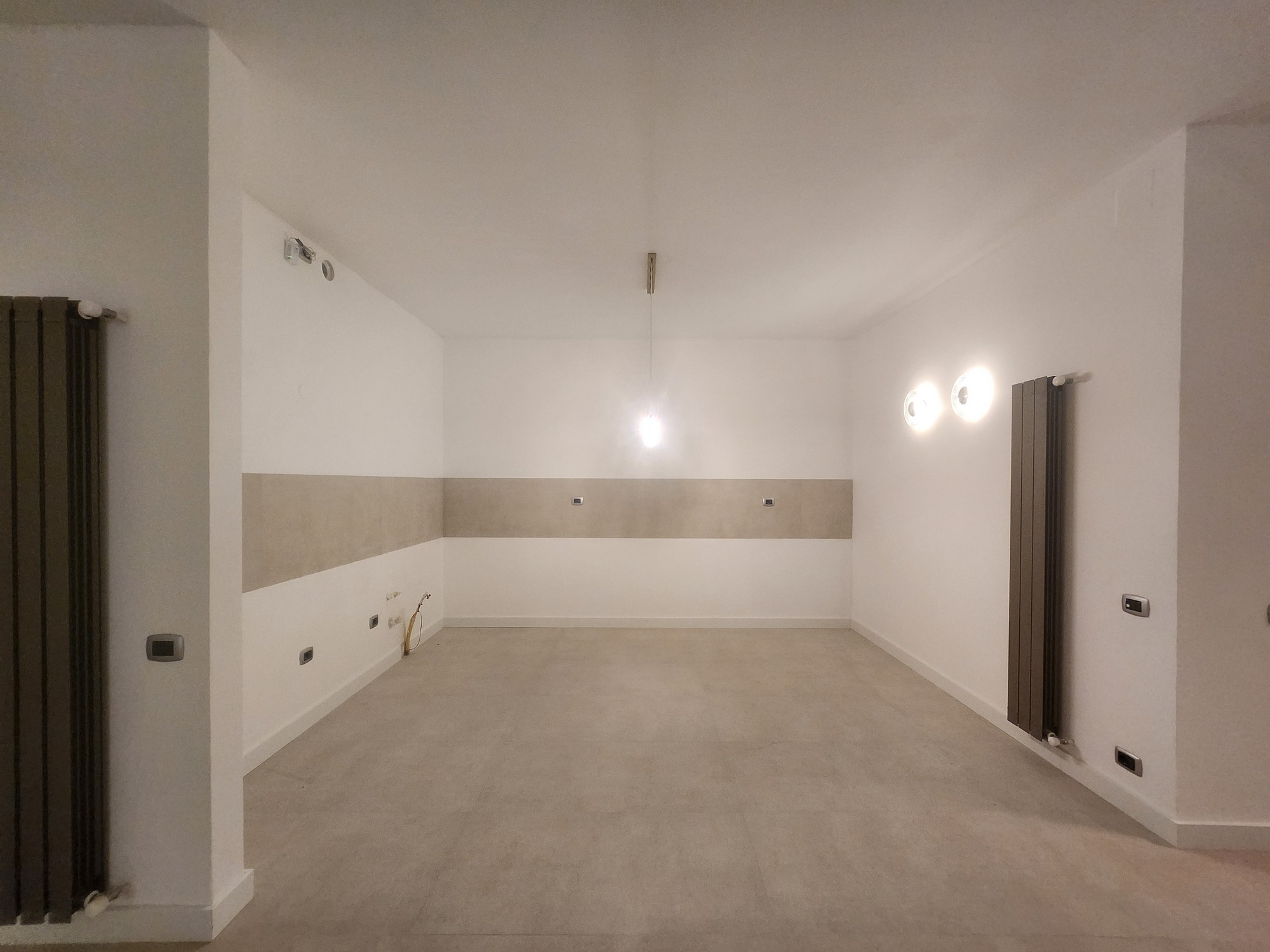 Guest bathroom tile work and lighting