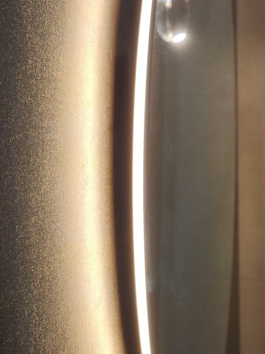 Contemporary kitchen with marble countertops, stainless steel appliances, and island